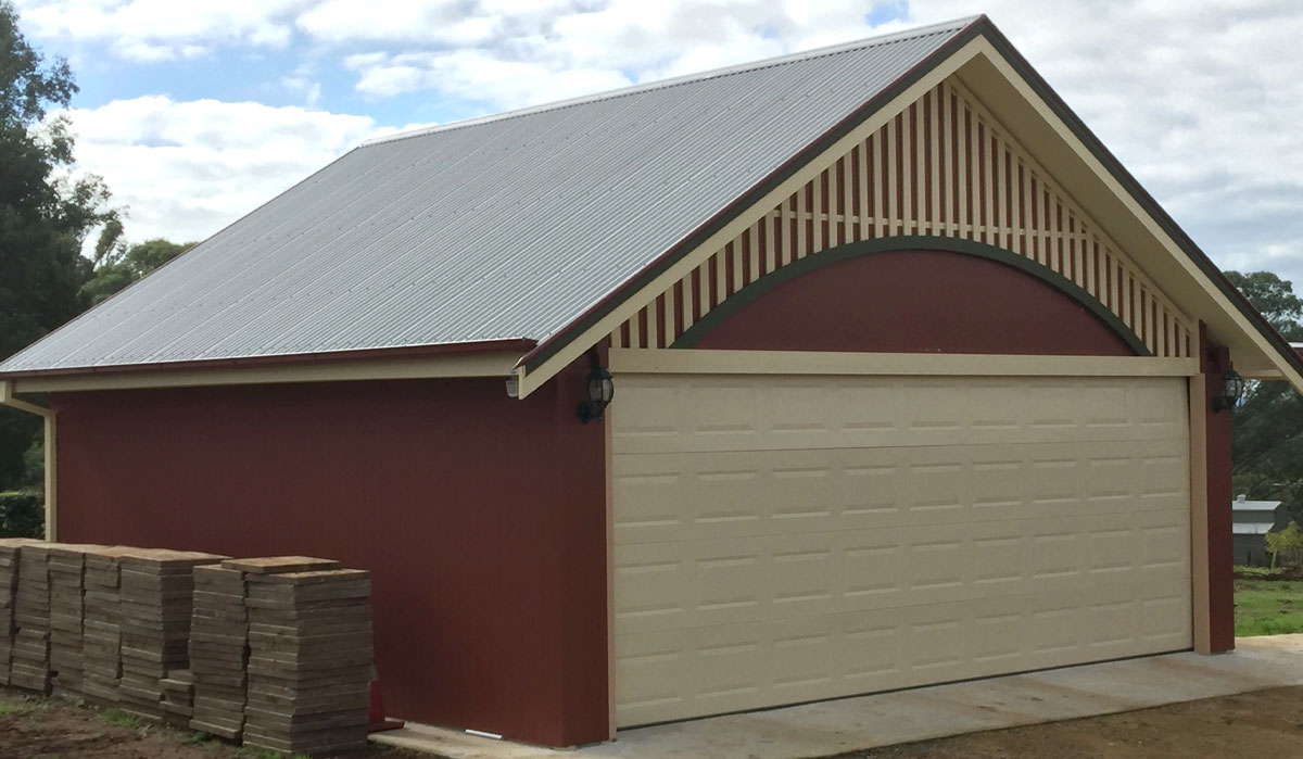 Garage with insulated roofing panels