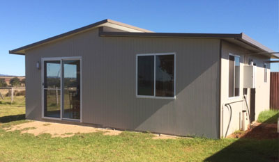 Modular DIY kit home with insulated wall & roof panels